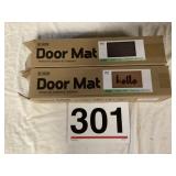 2 brand new doormats, one says hello, one is