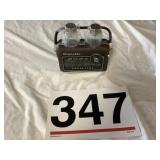 Salt and pepper shaker. Radio holder.