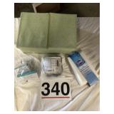 Clorox shower cleaner, shower curtain rod, dog