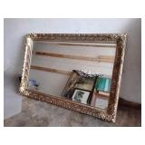 Gold frame mirror H 25 ih., W 36 in., D 2 in.