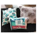 Throw pillows and a blanket