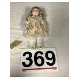 Treasured memories porcelain doll.