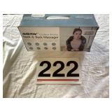 Neck and back massager, new in box.