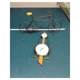 Atomic barometer and vintage bike decor
