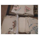 Fabric and embroidered doilies and pillow cases