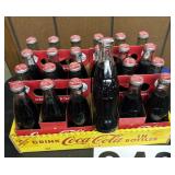 One case of Coca-Cola bottles