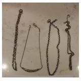 Silver colored necklaces