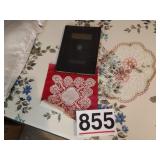 World atlas and doilies