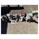 Concrete angels,  elephant with cracks, angry