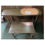 Tables small table is damaged on one leg