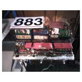 Train stocking hanger and lighted train