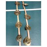Brass horse straps