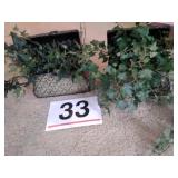 Metal chests with artificial ivy