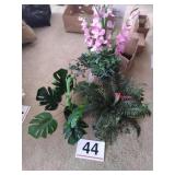 Artificial ferns and ivy in pots - one is wicker