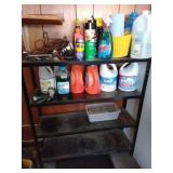 Black metal shelves with everything on it