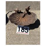 Metal birdbath one bird damaged wing