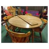 Table and chairs with a leaf