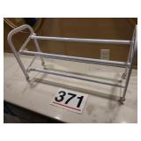 Metal shoe rack on wheels