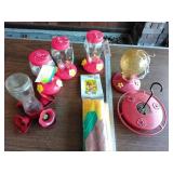 Hummingbird feeders and flag