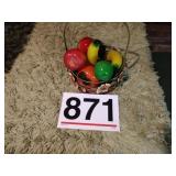 Glass fruit in metal basket