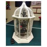 Bird cage with light up Christmas tree inside