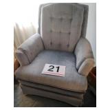 Blue velour swivel rocker chair