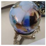Glass ornament on stand