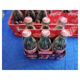 Crate of coca cola bottles