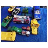 Plastic toy cars and trucks