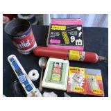 Rocks, hand warmers, silver spoon and misc