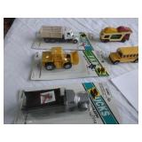 Trucks, plow and bus