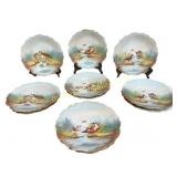 Eleven Limoges Porcelain Bird Plates