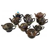 Ten Tea Pots