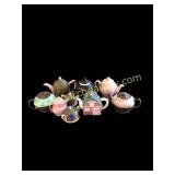 9 Nine Ceramic Teapots