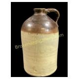 Brown and Tan Fluid Jug
