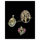 Three 10 k Gold Pendants