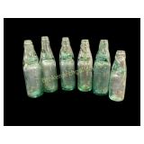Green Glass Specialty Bottles