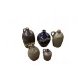 Five Stoneware Jugs with Handles