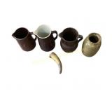 Four Ceramic Pitchers and Vessel