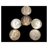 Kennedy and Ben Franklin Half Dollars