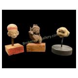 Three Mounted Artifacts