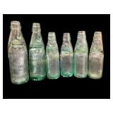 Six Vintage Codd Soda Bottles