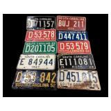 Ten vintage SC License Tags