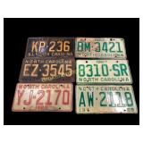 Six Vintage Car License Tags