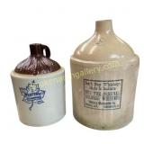 Two Stoneware Whiskey Jugs with Graphics