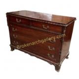 Mahogany Four-Drawer Chest with Carvings