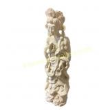 Carved Statue of Woman with Bird