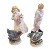 Four Hand-Painted Porcelain Figurines