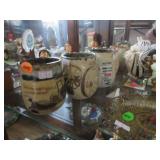 4 art pottery mugs with western theme, signed