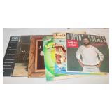 8 Records: Looney Tunes, Dr. Seuss, Kenny Rogers &